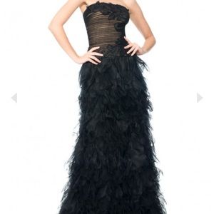 This is a black flamingo gown from the brand tadashi shoji